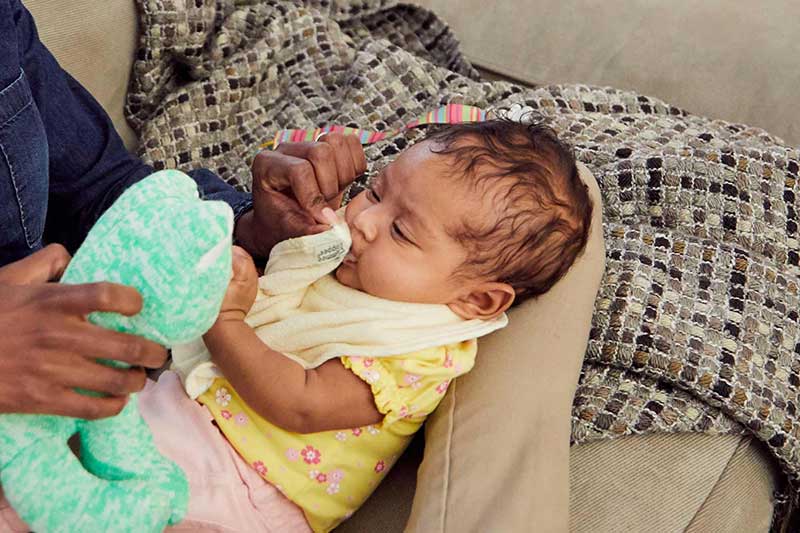 2 month old spitting up